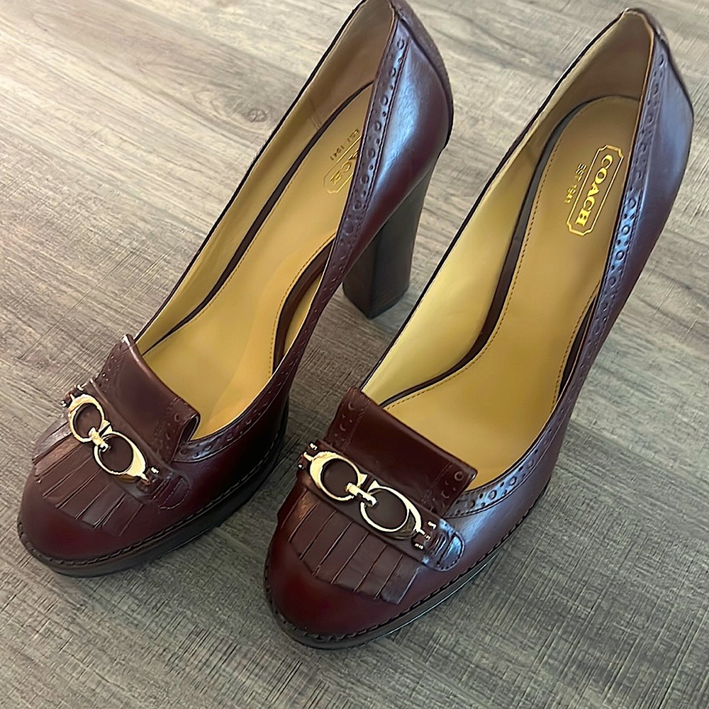 Wine color Coach Platform Pump.  Shoe has not been worn.
